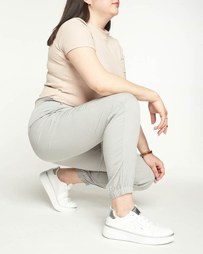 Pantaloni de jogging de damă gri din țesătură PLUS SIZE - Îmbrăcăminte