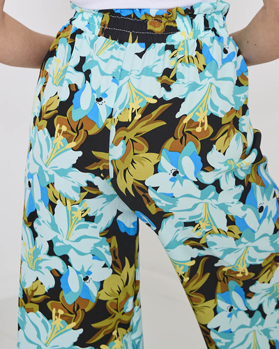 Pantaloni palazzo albaștri pentru femei cu flori colorate - Îmbrăcăminte