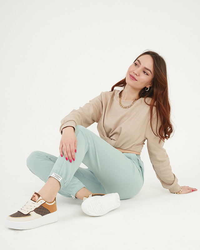 Pantaloni de damă din țesătură verde - Îmbrăcăminte