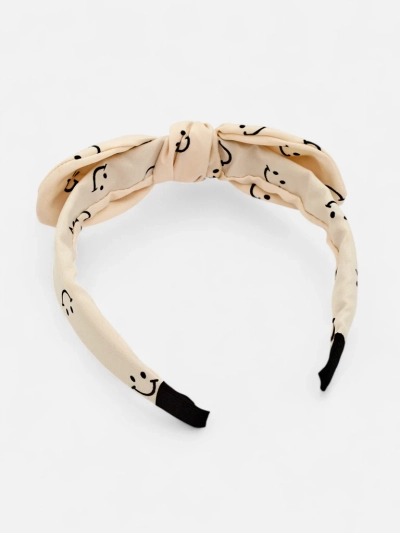 Royalfashion Bando pa cabellos de criaturas con un moñito con un diseño de caritas sonrientes