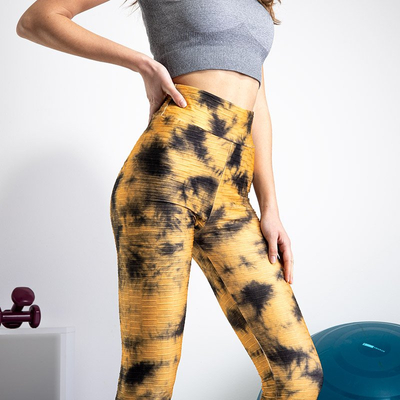 Jambiere galbene pentru femei cu pete decorative - Îmbrăcăminte