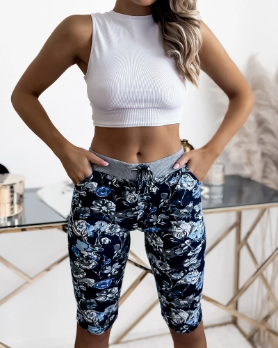 Pantaloni scurți 3/4 damă în bleumarin și flori PLUS SIZE - Îmbrăcăminte