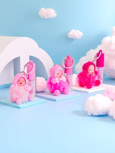 Luciu de buze pentru copii cu păpușă Fuchsia