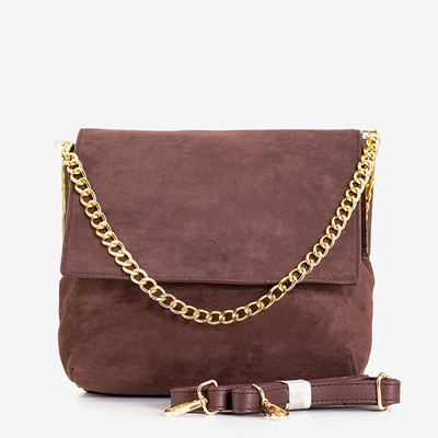 O mică geantă de mână maro închis pe un lanț - Genți de mână