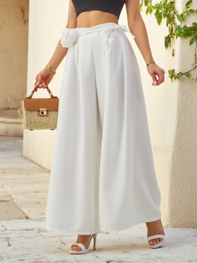 Pantaloni eleganți, largi pentru femei, cu o floare decorativă la brâu