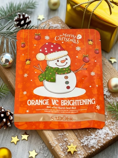 Mască de față festivă din material textil cu vitamina C - Iluminatoare
