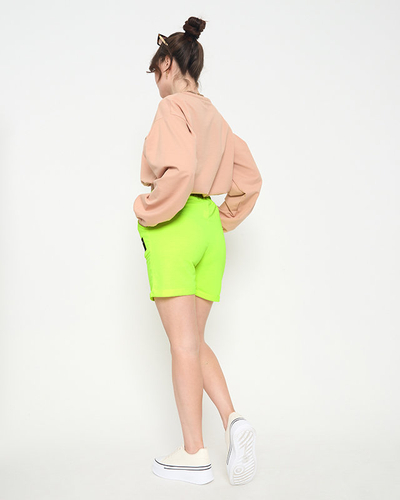 Pantaloni scurți de damă galben neon deasupra genunchiului - Îmbrăcăminte