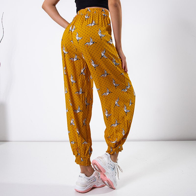 Pantaloni harem de culoare galbenă pentru femei cu păsări - Îmbrăcăminte