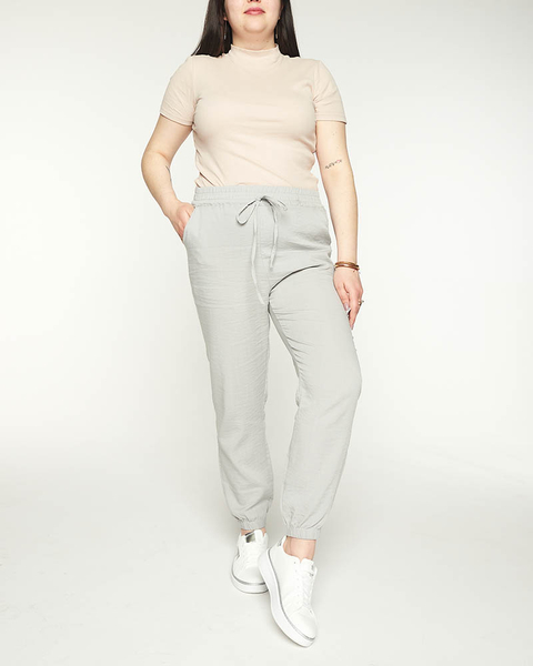 Pantaloni de jogging de damă gri din țesătură PLUS SIZE - Îmbrăcăminte