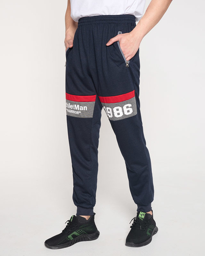 Pantaloni de trening pentru bărbați bleumarin cu inscripții - Îmbrăcăminte