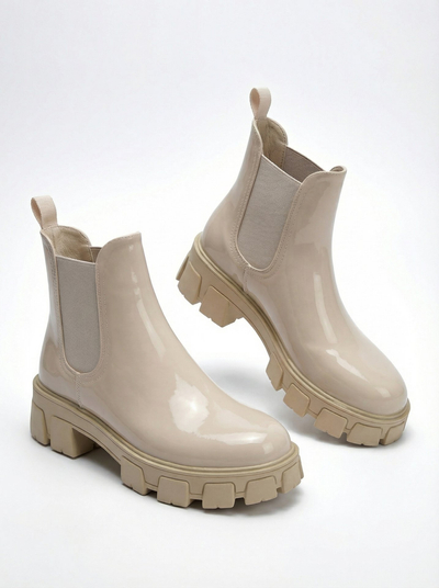 Royalfashion Botki na masywnej podeszwie z eko skóry lakierowanej Calista Weide