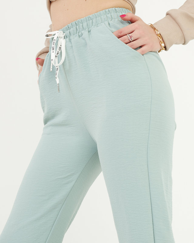 Pantaloni de damă din țesătură verde - Îmbrăcăminte
