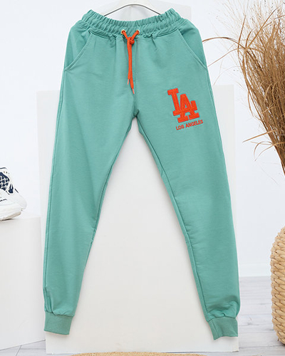Pantaloni de trening verzi de dama cu un petic colorat - Imbracaminte