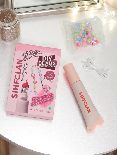 Luciu de buze cu brățară Gloss & Charm Melon Pop
