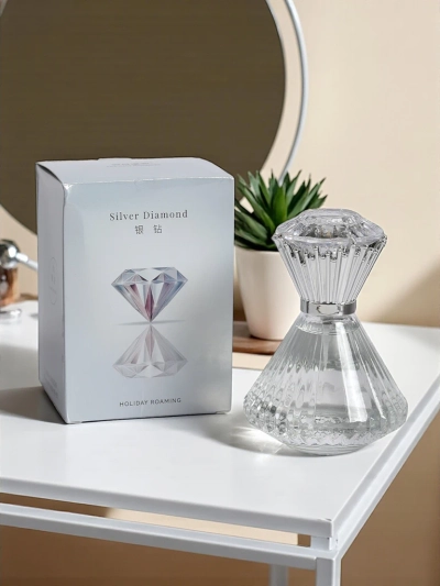 Aurelia Silver Diamond – Perfume pa hende muhé 50ml ku un boter úniko