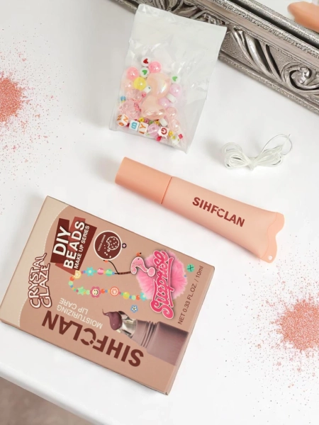 Luciu de buze cu brățară Gloss & Charm Cocoa Cookie