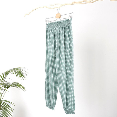 Pantaloni pentru femei verde cu buline PLUS SIZE - Îmbrăcăminte