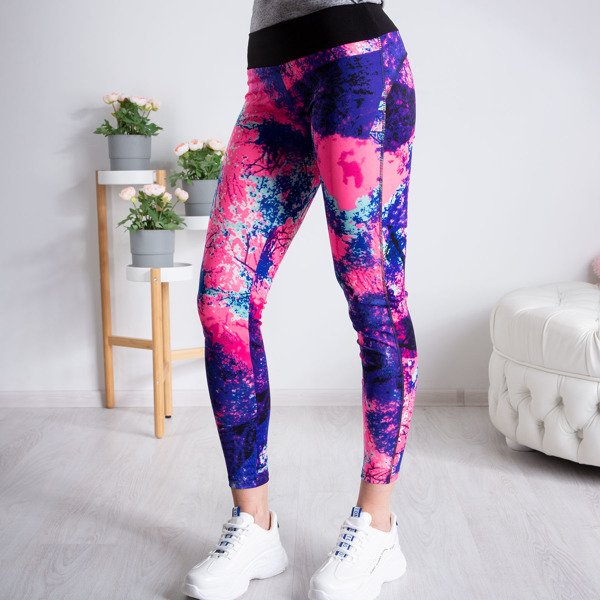 Kolorowe legginsy z przewagą neonowego różu - Spodnie