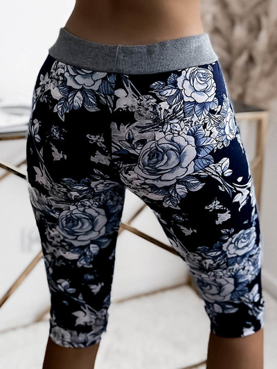 Pantaloni scurti de dama 3/4 florali in culoarea bleumarin si albastru. Îmbrăcăminte de mărimi mari
