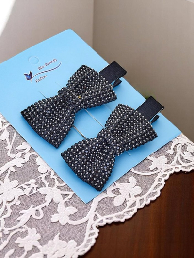 Royalfashion Set de 2 agrafe de păr cu fundițe și pietre strălucitoare Isadora