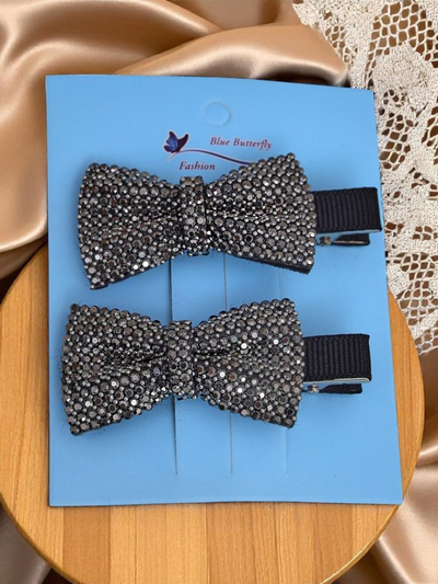 Royalfashion Set de 2 agrafe de păr cu fundițe și strasuri Isadora
