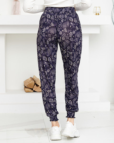 Pantaloni de damă bej și bleumarin cu imprimeu - Îmbrăcăminte