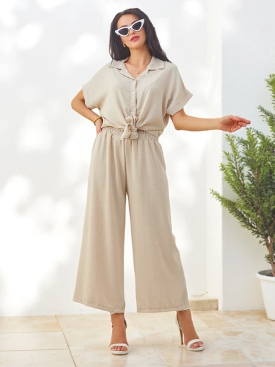 Royalfashion Compleu femei cu cămașă scurtă cu mâneci legate și pantaloni evazați cu pietre strass