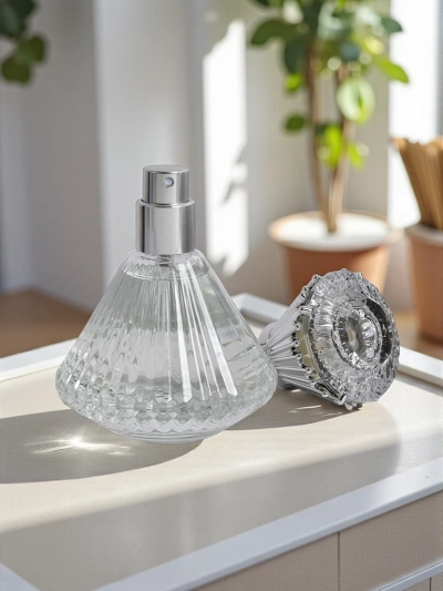 Aurelia Silver Diamond – Perfume pa hende muhé 50ml ku un boter úniko