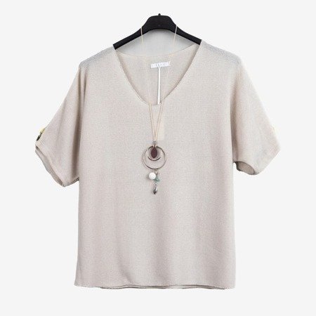 Beżowa damska bluzka z krótkim rękawem - Odzież