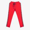 Czerwone spodnie dresowe z lampasami - Odzież