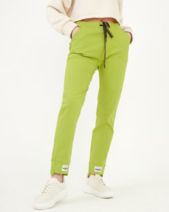 Pantaloni de damă din țesătură verde deschis cu petice - Îmbrăcăminte