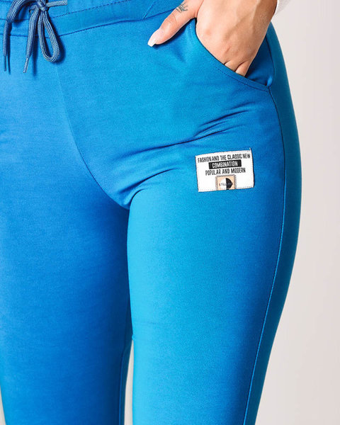Pantaloni de trening de damă albaștri cu petic- Îmbrăcăminte