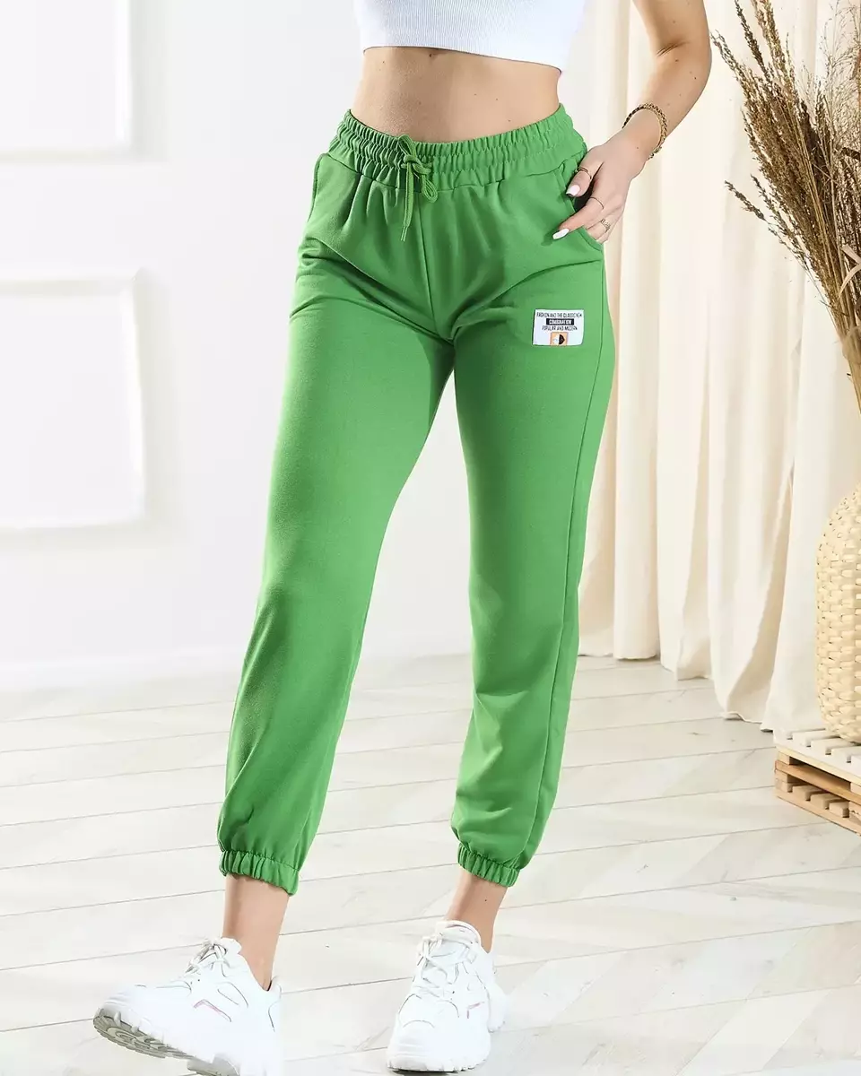Pantaloni de trening de damă de culoare verde închis - Îmbrăcăminte