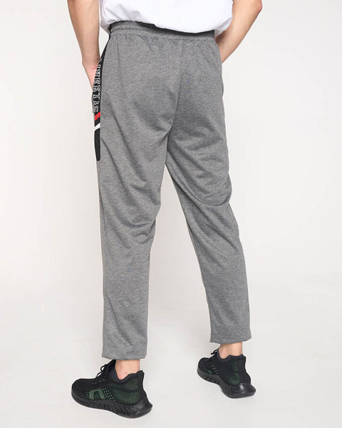 Pantaloni de trening gri pentru bărbați cu inscripții - Îmbrăcăminte