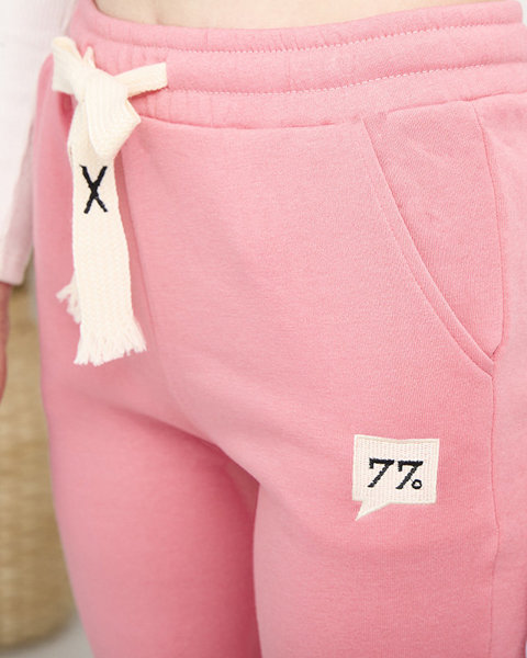 Pantaloni de trening izolat pentru femei roz - Îmbrăcăminte