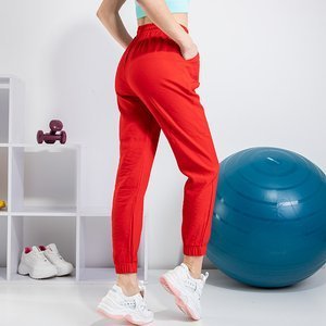 Pantaloni de trening pentru femei roșii PLUS SIZE - Îmbrăcăminte
